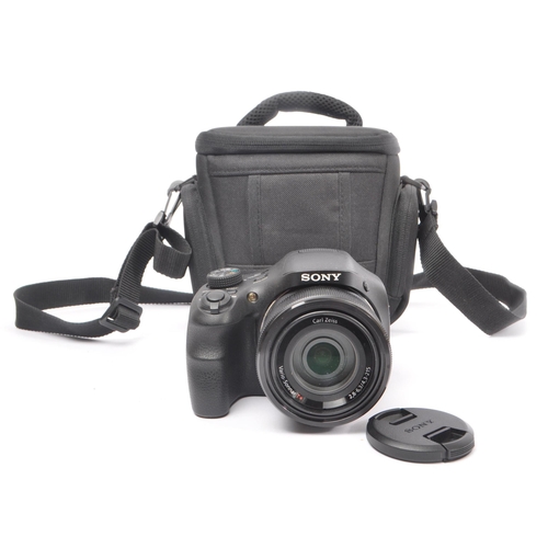 211 - Sony - A Sony DSC-HX300 DSLR style compact digital super-zoom telephoto bridge camera. The camera in... 