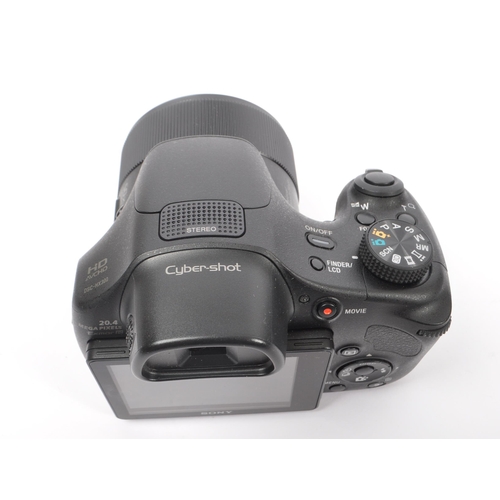 211 - Sony - A Sony DSC-HX300 DSLR style compact digital super-zoom telephoto bridge camera. The camera in... 