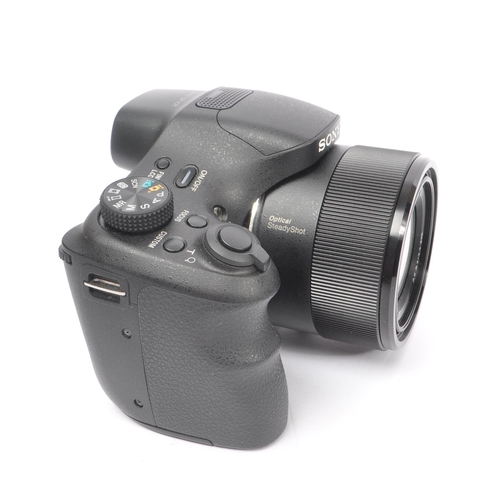 211 - Sony - A Sony DSC-HX300 DSLR style compact digital super-zoom telephoto bridge camera. The camera in... 