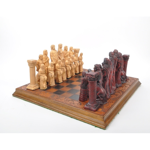 214 - J Letts - Gods of Mythology - A 20th century resin J. Letts Gods of Mythology chess set, alongside l... 