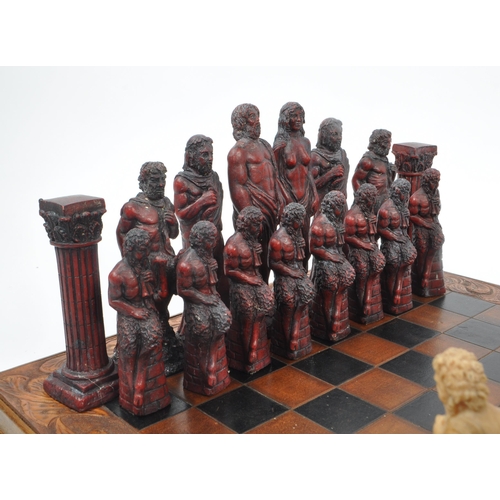 214 - J Letts - Gods of Mythology - A 20th century resin J. Letts Gods of Mythology chess set, alongside l... 