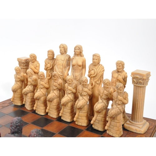 214 - J Letts - Gods of Mythology - A 20th century resin J. Letts Gods of Mythology chess set, alongside l... 