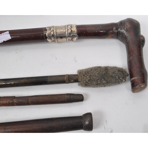 216 - A collection of Edwardian and later swagger sticks / walking canes. Some examples including duck hea... 