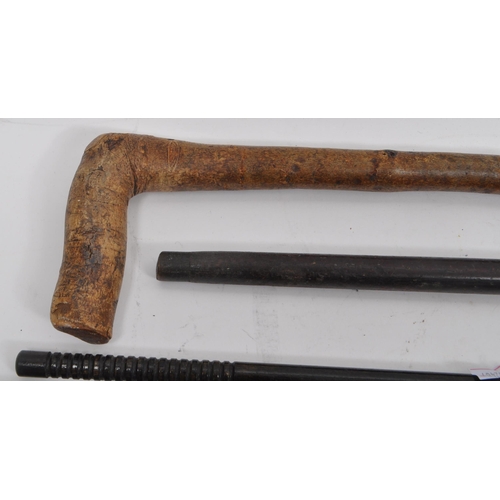 216 - A collection of Edwardian and later swagger sticks / walking canes. Some examples including duck hea... 