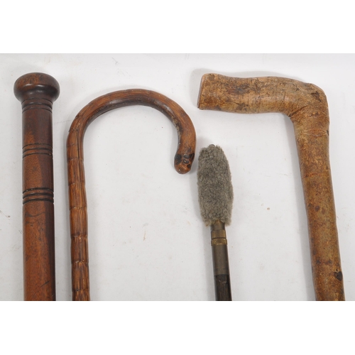 216 - A collection of Edwardian and later swagger sticks / walking canes. Some examples including duck hea... 