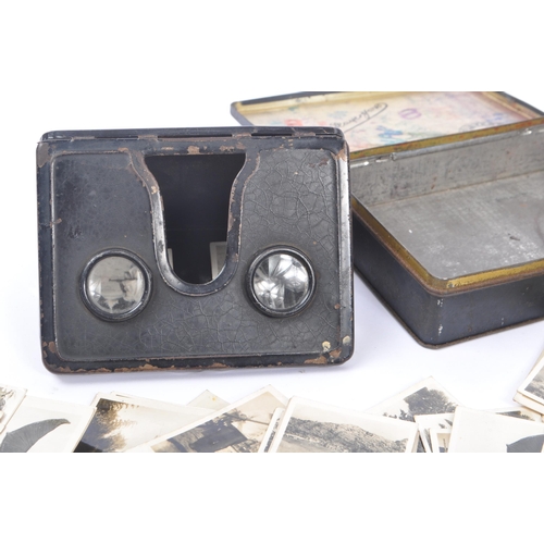 218 - An early 20th Century circa 1920s / 1930s metal folding camerascope viewer to include cards depictin... 
