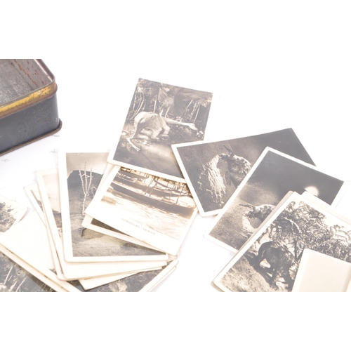 218 - An early 20th Century circa 1920s / 1930s metal folding camerascope viewer to include cards depictin... 