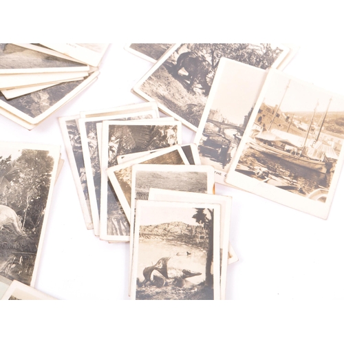 218 - An early 20th Century circa 1920s / 1930s metal folding camerascope viewer to include cards depictin... 