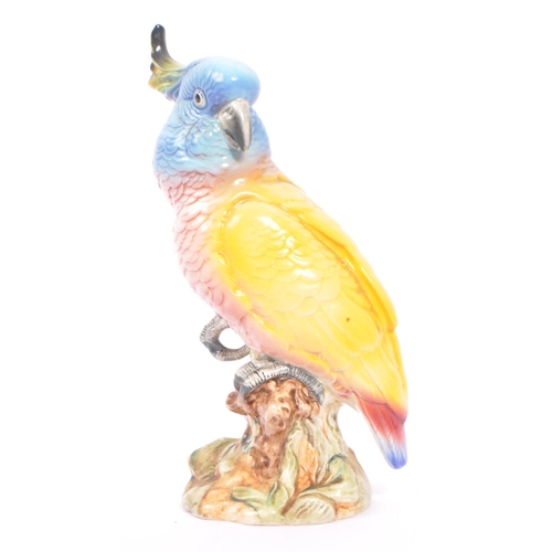 22 - Beswick - Porcelain china figurine of a cockatoo bird. Model number 1180. Made in England. Perch on ... 