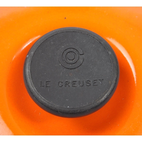 220 - Le Creuset - A collection of four varying sized cast iron Le Creuset saucepans with lids in volcanic... 