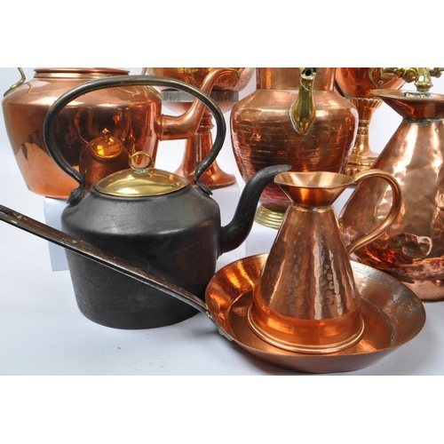 223 - A large collection of 19th century and later brass and copper ware. To include a large water urn, a ... 