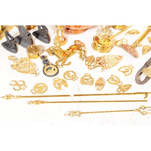 227 - A collection of 19th century and later copper and brass wares. To include flat irons and skillets, c... 