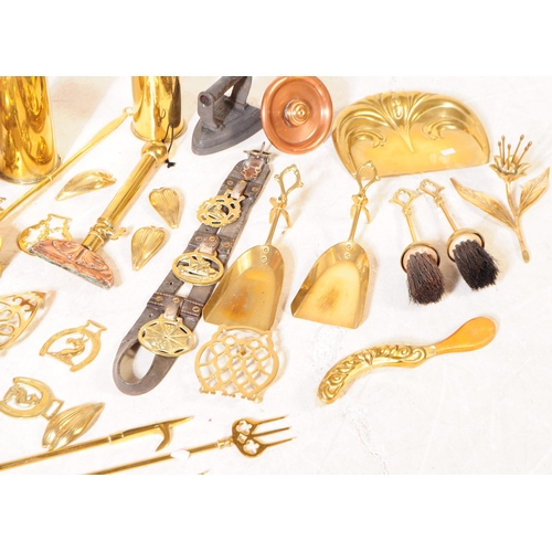 227 - A collection of 19th century and later copper and brass wares. To include flat irons and skillets, c... 