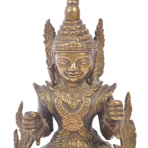 228 - A Burmese bronze Buddha figure on a blue rectangular resin base with hands in fists raised to front,... 