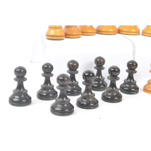 233 - A 20th Century set of staunton standard style of carved wooden chess pieces having felt to bottom. K... 