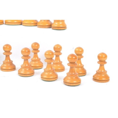 233 - A 20th Century set of staunton standard style of carved wooden chess pieces having felt to bottom. K... 