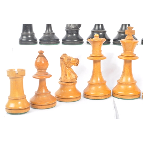 233 - A 20th Century set of staunton standard style of carved wooden chess pieces having felt to bottom. K... 