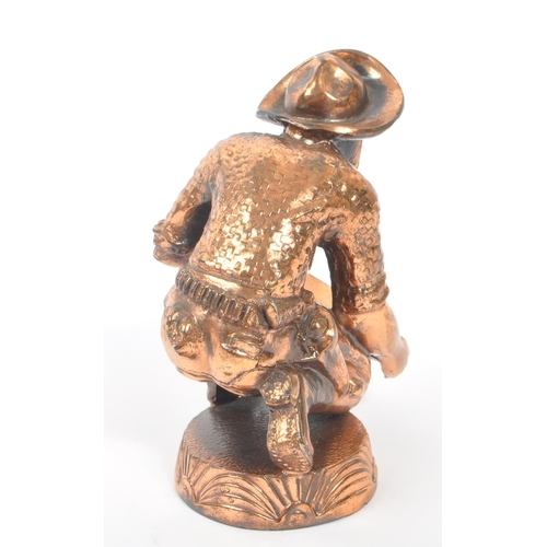 234 - A 20th Century vintage American copper effect figure in the form of a gold miner / panning man kneel... 