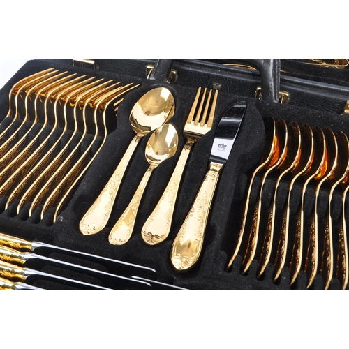 235 - A 20th Century German Bestecke SBS Solingen gold plated 12 person canteen of cutlery to include tabl... 