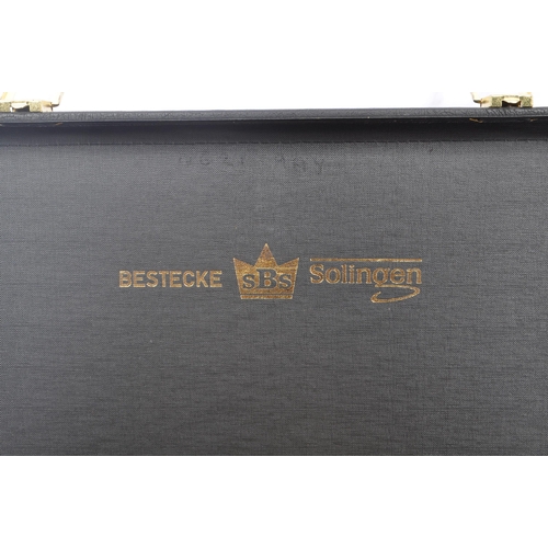 235 - A 20th Century German Bestecke SBS Solingen gold plated 12 person canteen of cutlery to include tabl... 