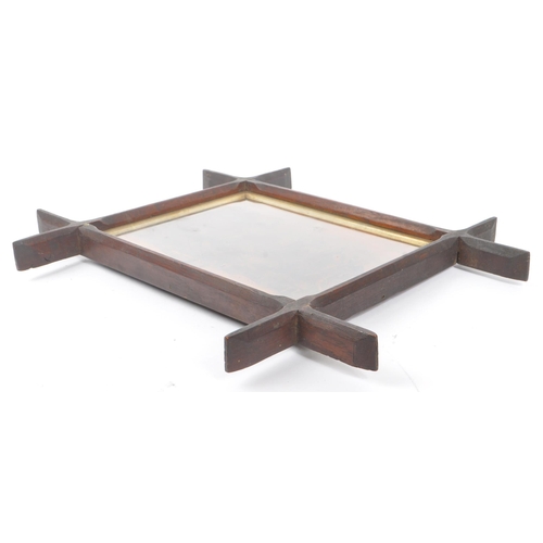 236 - An early 20th Century print depicting a carriage scene with horses and people standing and sitting o... 