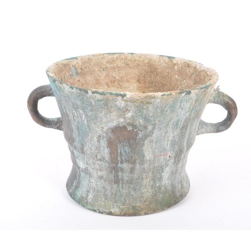 239 - A large late 17th Century bronze twin handled mortar bowl / pot having rounded handles to either sid... 
