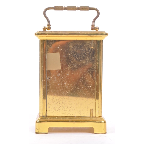 240 - Bayard, France - A 20th century brass eight day carriage clock. With carry handle to top, white face... 