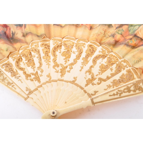 242 - A 19th century French Rococo style bone handled folding hand fan. The fan featuring gilt painted det... 