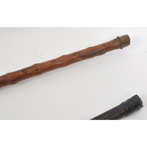 244 - Two early 20th century walking stick / canes. Circa 1910s with silver bands, one hallmarked other st... 