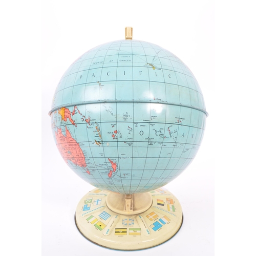248 - A mid 20th century tin plate globe. The globe having a plastic mount with tin base and globe, featur... 