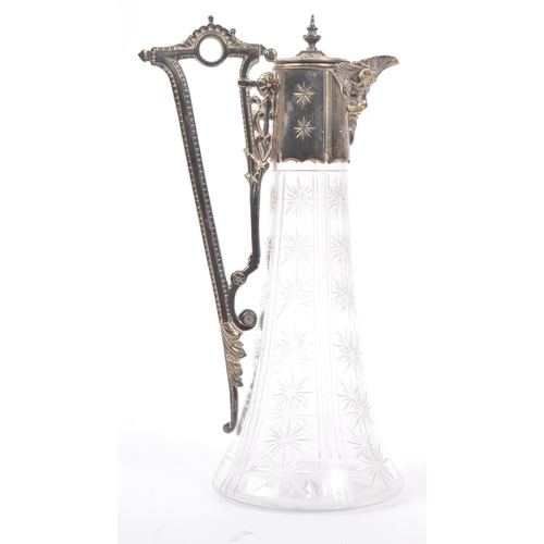 249 - A late 19th Century Victorian silver plate and cut glass ewer / jug. Having star shaped cut glass de... 
