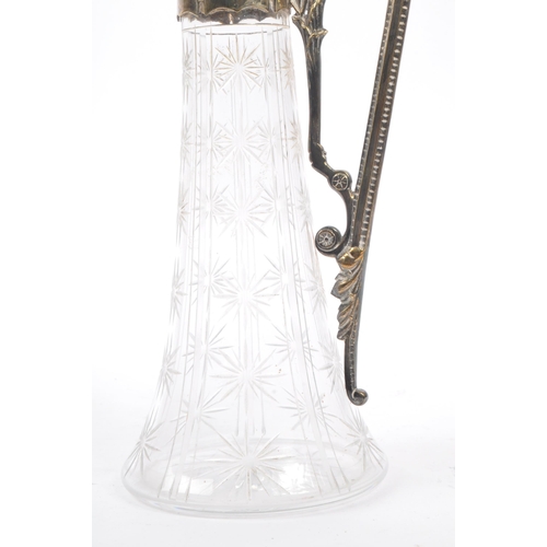 249 - A late 19th Century Victorian silver plate and cut glass ewer / jug. Having star shaped cut glass de... 