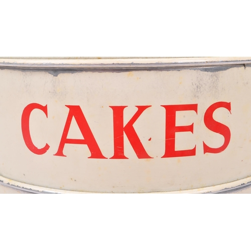 250 - A large mid Century three tiered cake tin of circular form having cream ground with silver lid and r... 