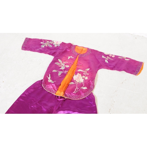 256 - Mid Century Chinese silk clothing items having intricate foliate embroidery of peonies and butterfli... 