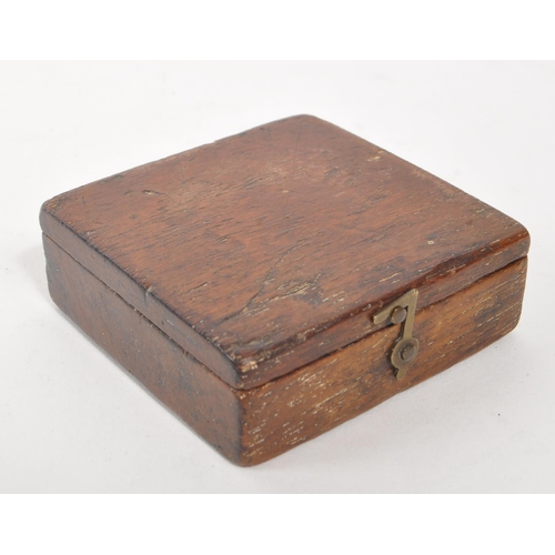 257 - A 19th century Victorian traveling compass. Mahogany case with hinged lid, and glass circular window... 