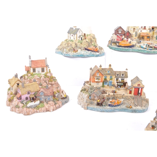 259 - Danbury Mint - A collection of eight Danbury Mint scenic models to include items from the The RNLI C... 