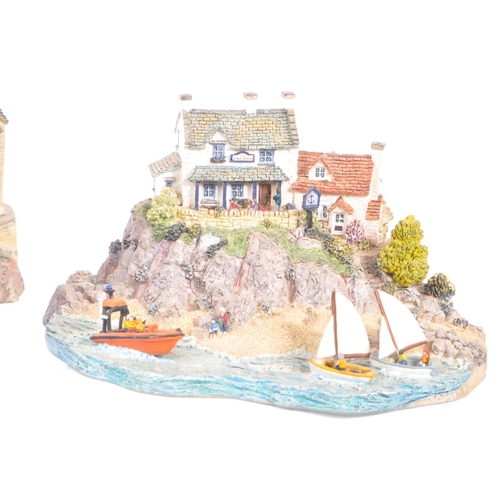 259 - Danbury Mint - A collection of eight Danbury Mint scenic models to include items from the The RNLI C... 
