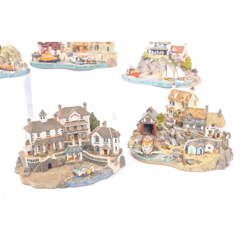 259 - Danbury Mint - A collection of eight Danbury Mint scenic models to include items from the The RNLI C... 