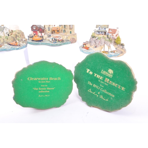 259 - Danbury Mint - A collection of eight Danbury Mint scenic models to include items from the The RNLI C... 