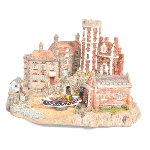 260 - Danbury Mint - A collection of eight Danbury Mint scenic models depicting harbourside / seascape sce... 