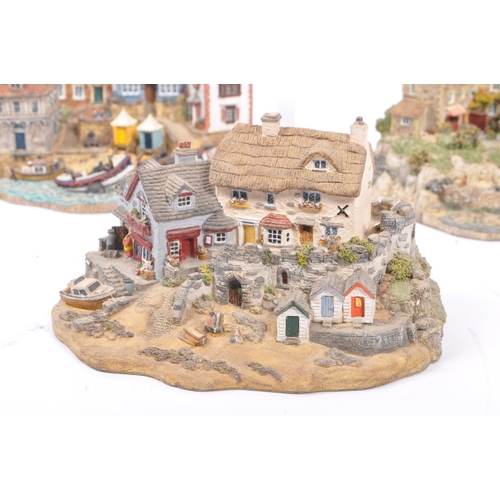 260 - Danbury Mint - A collection of eight Danbury Mint scenic models depicting harbourside / seascape sce... 