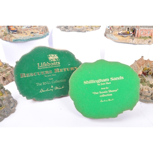 260 - Danbury Mint - A collection of eight Danbury Mint scenic models depicting harbourside / seascape sce... 