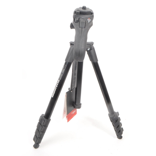 261 - A Manfrotto MKC3-H01 compact photo-movie kit tripod. Of aluminium and plastic construction with a pi... 