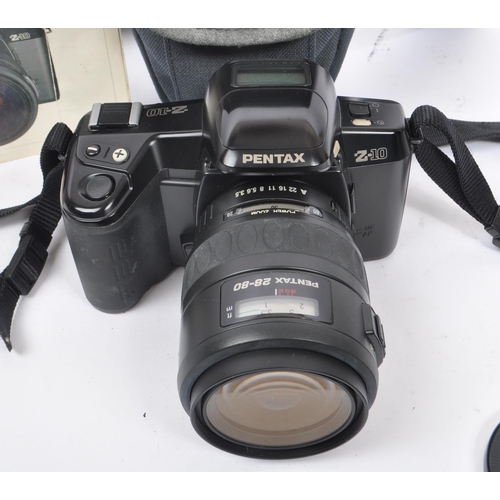 267 - Pentax - A late 20th century 1990s Pentax Z-10 35mm SLR camera. The camera in black colourway with 2... 