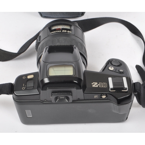 267 - Pentax - A late 20th century 1990s Pentax Z-10 35mm SLR camera. The camera in black colourway with 2... 