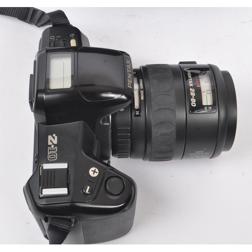 267 - Pentax - A late 20th century 1990s Pentax Z-10 35mm SLR camera. The camera in black colourway with 2... 