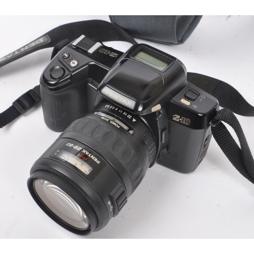 267 - Pentax - A late 20th century 1990s Pentax Z-10 35mm SLR camera. The camera in black colourway with 2... 