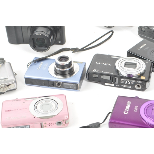 269 - A collection of contemporary digital compact mirrorless and point and shoot cameras. The collection ... 