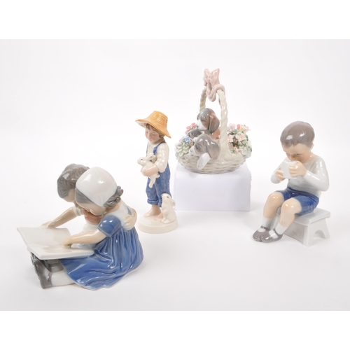 27 - Royal Copenhagen - Collection of three 20th century and later Danish porcelain of child figures. Com... 