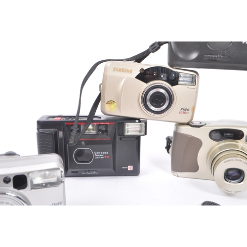 271 - A collection of late 20th century 35mm and other compact film point and shoot cameras. The collectio... 